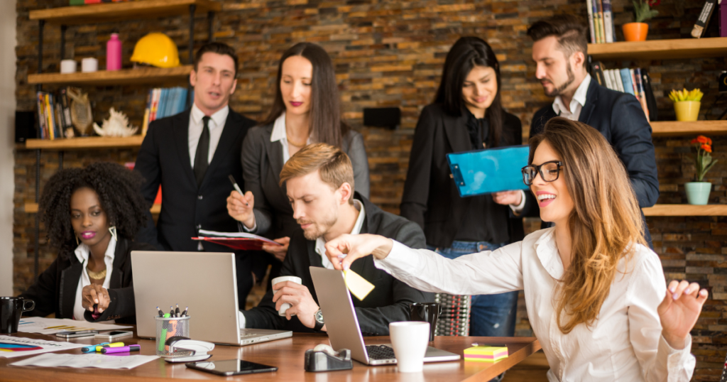 team of creative professionals working together in an office